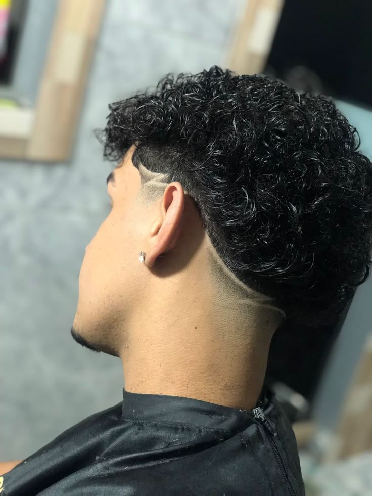 Mid Fade with Hair Designs